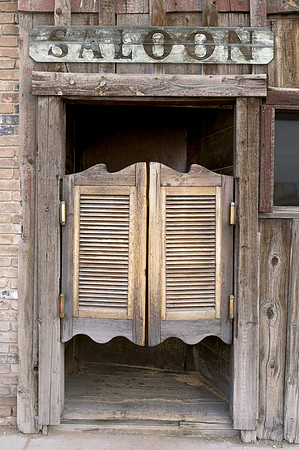 Old Western Swinging Saloon Doors with Sign